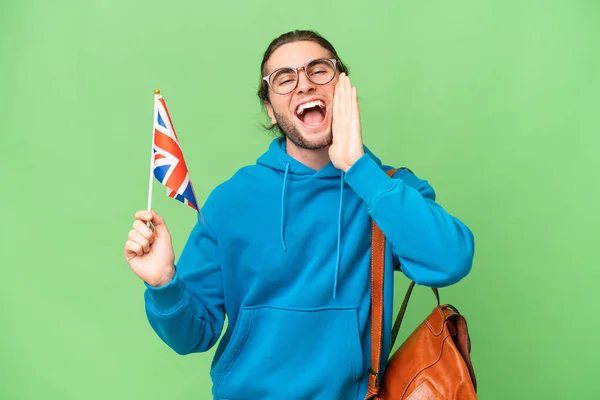 Fiatal Jóképű Férfi Tart Egy Egyesült Királyság Zászló Felett Elszigetelt — Stock Fotó