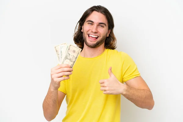 Νεαρός Όμορφος Άντρας Παίρνει Πολλά Χρήματα Απομονωμένος Λευκό Φόντο Τους — Φωτογραφία Αρχείου