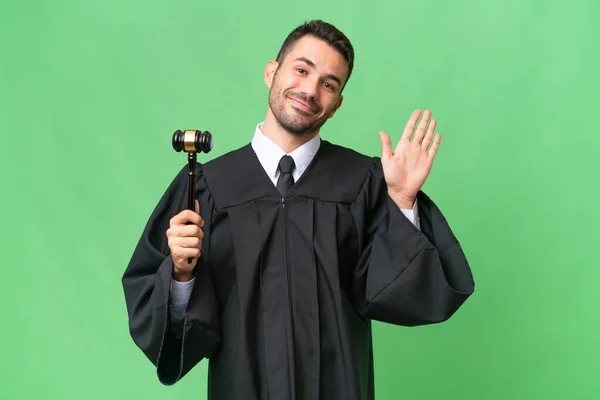 Judge Caucasian Man Isolated Background Saluting Hand Happy Expression — Stock Photo, Image