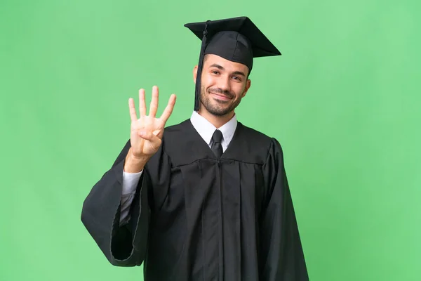 Jonge Universiteit Afgestudeerde Man Geïsoleerde Achtergrond Gelukkig Tellen Vier Met — Stockfoto
