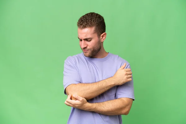 Young Handsome Caucasian Man Isolated Green Chroma Background Pain Elbow — Stock Photo, Image