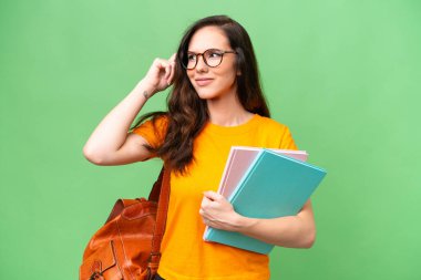 Young student caucasian woman over isolated background having doubts and thinking