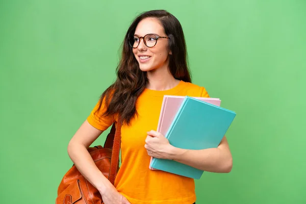 Young Student Caucasian Woman Isolated Background Posing Arms Hip Smiling — 스톡 사진