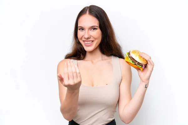 Young Caucasian Woman Holding Burger Isolated White Background Inviting Come — Stock Photo, Image