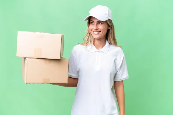 Delivery Uruguayan Woman Isolated Background Looking Side — Stock Photo, Image