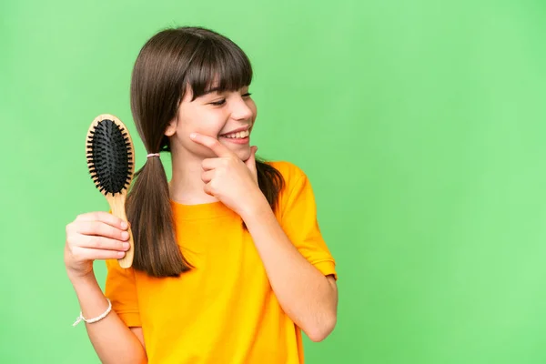 Little Caucasian Girl Hair Comb Isolated Background Thinking Idea Looking — Stock Photo, Image