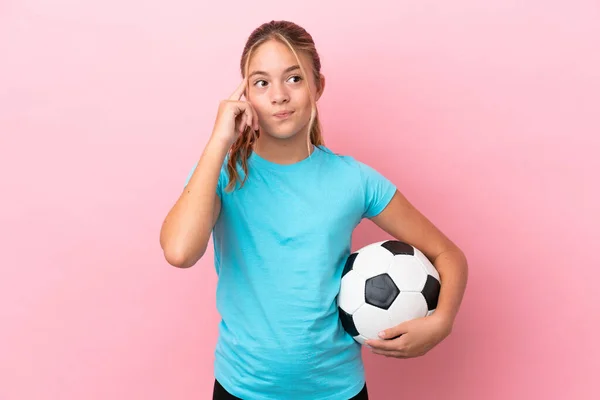 Little Football Player Girl Isolated Pink Background Having Doubts Thinking — 스톡 사진