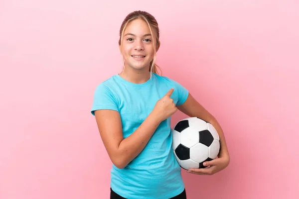 Little Football Player Girl Isolated Pink Background Pointing Side Present — Stock Photo, Image