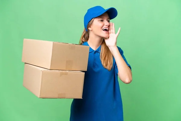Delivery Caucasian Woman Isolated Background Shouting Mouth Wide Open Side — Stock Photo, Image