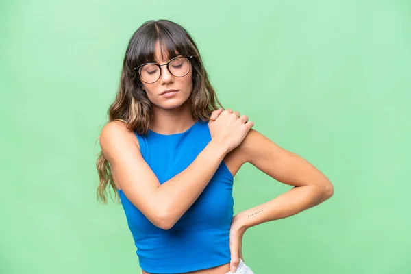 stock image Young caucasian woman over isolated background suffering from pain in shoulder for having made an effort