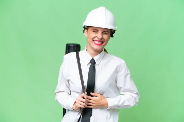 Young Architect Woman Helmet Holding Blueprints Isolated Background Smiling Lot — Stock Photo, Image
