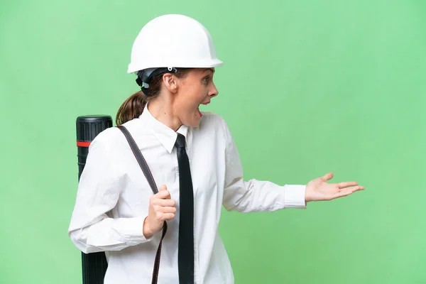 Young Architect Woman Helmet Holding Blueprints Isolated Background Surprise Expression — Stock Photo, Image