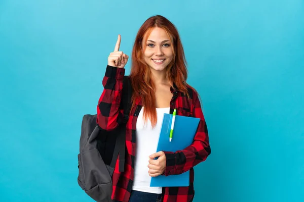 Teenager Student Russian Girl Isolated Blue Background Pointing Great Idea — Stockfoto