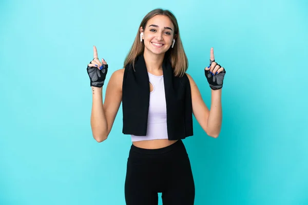Young Sport Woman Isolated Blue Background Pointing Great Idea — Stock Photo, Image