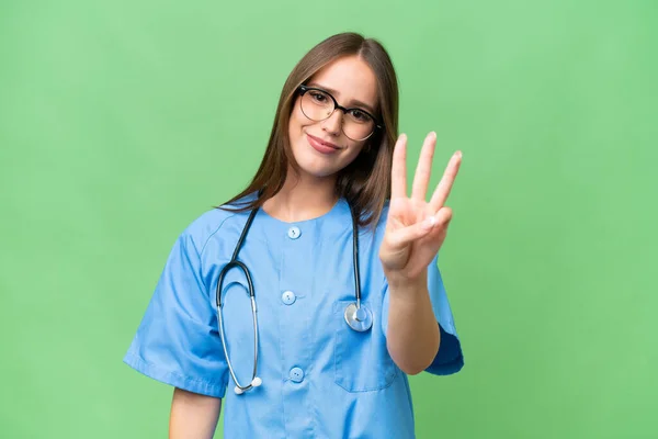 Junge Krankenschwester Kaukasische Frau Über Isolierten Hintergrund Glücklich Und Zählen — Stockfoto