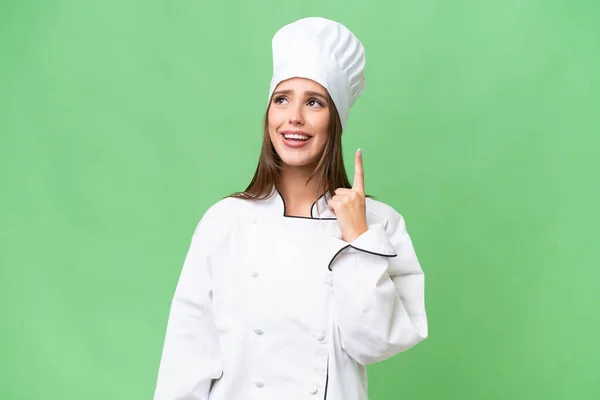 Giovane Chef Donna Caucasica Sfondo Isolato Puntando Sorpreso — Foto Stock