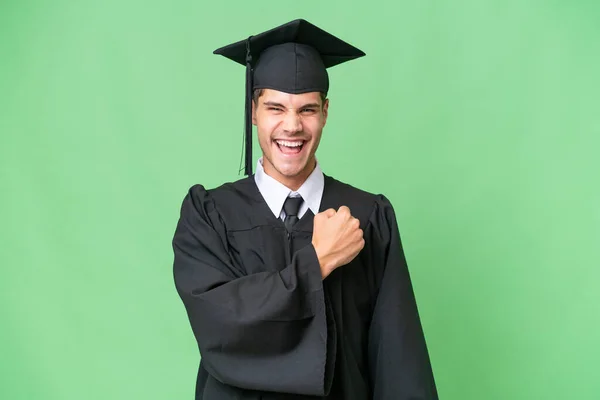 若い大学院生Caucasian男上の隔離された背景にある勝利を祝う — ストック写真