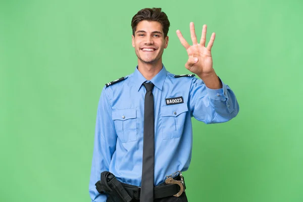 Junger Polizist Über Isolierten Hintergrund Glücklich Und Zählt Mit Fingern — Stockfoto