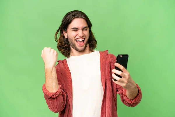 Young Handsome Man Isolated Background Phone Victory Position — Stock Photo, Image