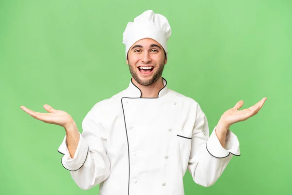 Jovem Bonito Chef Homem Sobre Isolado Fundo Com Chocado Facial — Fotografia de Stock