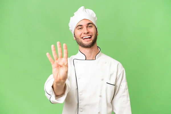 Joven Guapo Chef Hombre Sobre Aislado Fondo Feliz Contar Cuatro — Foto de Stock