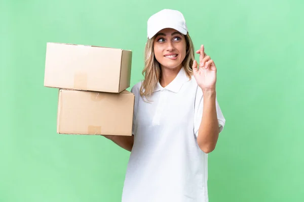 Delivery Uruguayan Woman Isolated Background Fingers Crossing Wishing Best — Stock Photo, Image