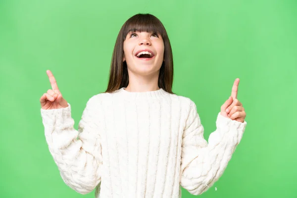 stock image Little caucasian girl over isolated background surprised and pointing up