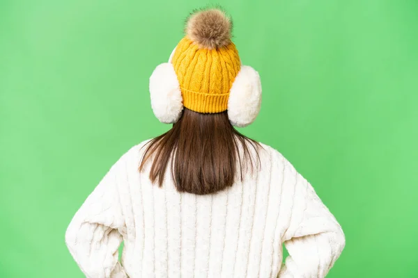 Kleines Kaukasisches Mädchen Trägt Wintermuffs Über Isoliertem Hintergrund Rückenlage — Stockfoto