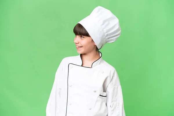 Piccolo Caucasico Chef Ragazza Oltre Isolato Sfondo Cercando Lato — Foto Stock