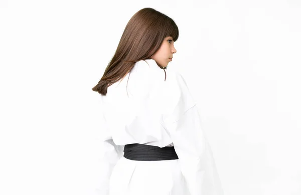 Poco Caucásico Chica Sobre Aislado Blanco Fondo Haciendo Karate Espalda — Foto de Stock