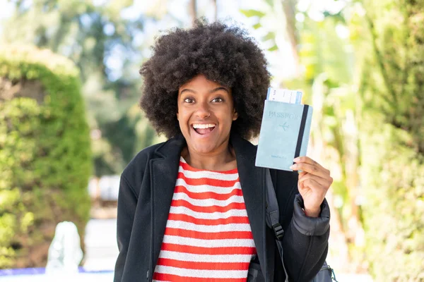 African American Girl Holding Passport Outdoors Surprise Shocked Facial Expression — Stock Photo, Image