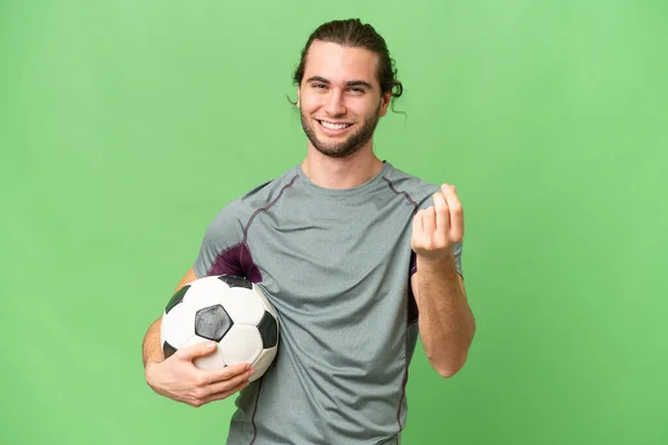 Νεαρός Όμορφος Ποδοσφαιριστής Πάνω Από Απομονωμένο Υπόβαθρο Κάνοντας Χειρονομία Χρήματα — Φωτογραφία Αρχείου