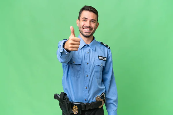 Young Police Caucasian Man Isolated Background Thumbs Because Something Good — Stock Photo, Image