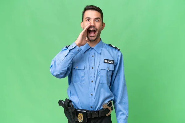 Junger Polizeikaukasier Über Isolierten Hintergrund Mit Überraschung Und Schockiertem Gesichtsausdruck — Stockfoto