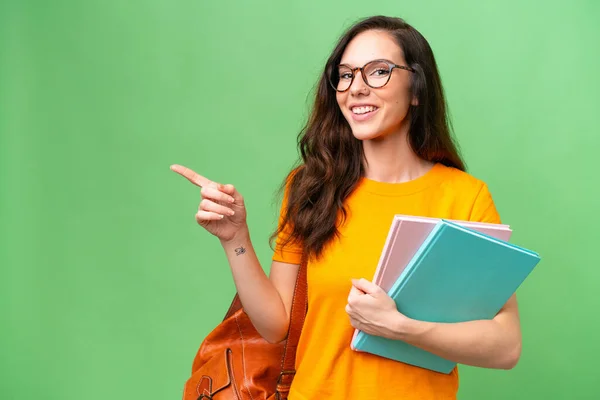 Young Student Caucasian Woman Isolated Background Pointing Finger Side — Stockfoto