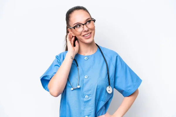 Young Caucasian Surgeon Doctor Woman Isolated White Background Thinking Idea — Stock Photo, Image