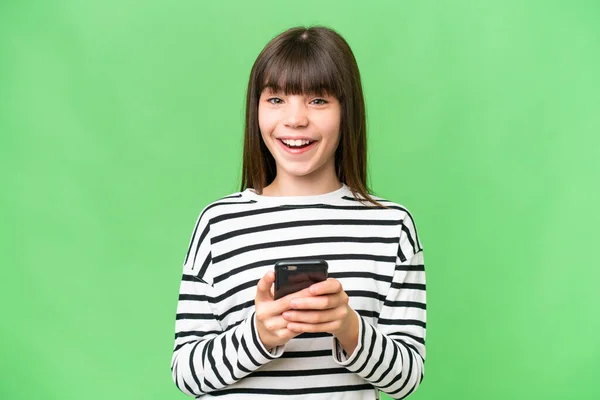 stock image Little caucasian girl over isolated background surprised and sending a message