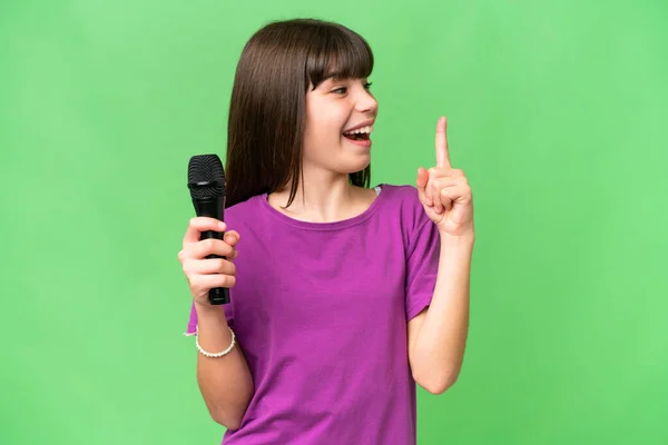 Little Singer Girl Picking Microphone Isolated Background Intending Realizes Solution — Stock Photo, Image