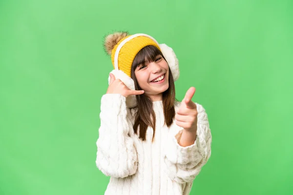 Little Caucasian Girl Wearing Winter Muffs Isolated Background Making Phone — Stock Photo, Image