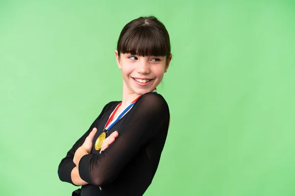 Little Caucasian Girl Medals Isolated Background Arms Crossed Happy — Stock Photo, Image