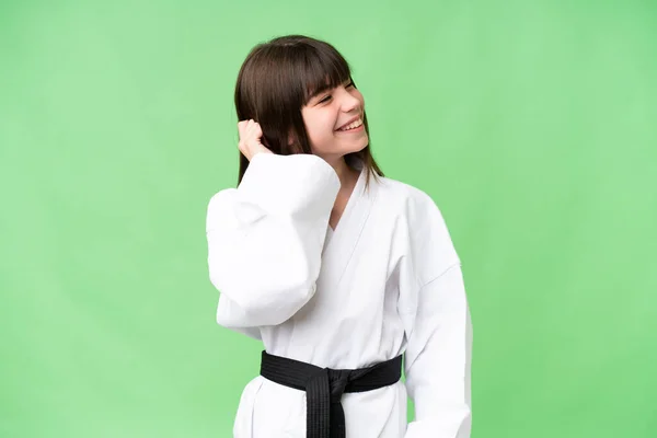 Little Caucasian Girl Doing Karate Isolated Background Thinking Idea — Stock Photo, Image