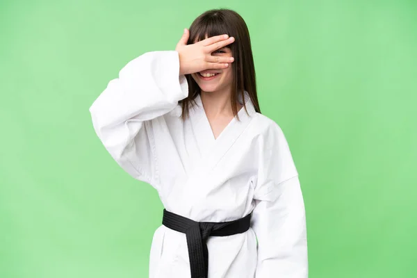 Little Caucasian Girl Doing Karate Isolated Background Covering Eyes Hands — Stock Photo, Image