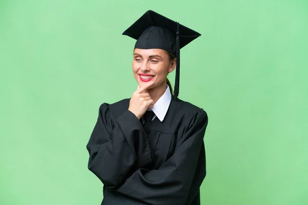Joven Universidad Graduado Caucásico Mujer Sobre Aislado Fondo Mirando Lado — Foto de Stock