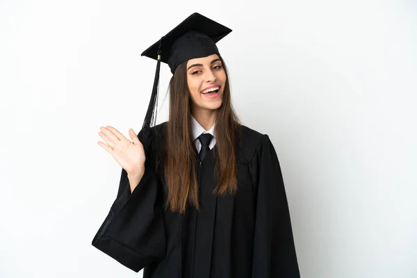 Graduação Universitária Jovem Isolado Fundo Branco Saudando Com Mão Com — Fotografia de Stock