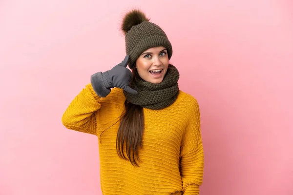 Young Caucasian Girl Winter Hat Isolated Pink Background Making Phone — Stock Photo, Image