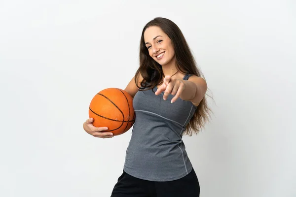 Young Woman Playing Basketball Isolated White Background Pointing Front Happy — Zdjęcie stockowe