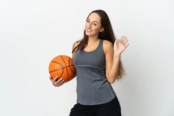 Young Woman Playing Basketball Isolated White Background Saluting Hand Happy — Stock Photo, Image