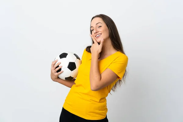 年轻的足球运动员女人在孤独的白色背景上快乐而微笑 — 图库照片