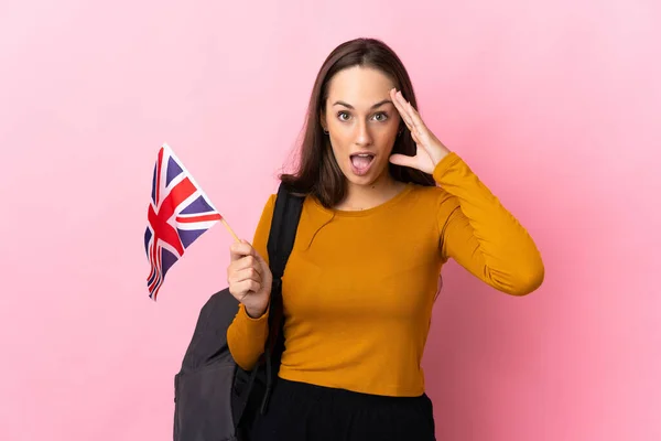 Young Hispanic Woman Holding United Kingdom Flag Surprise Expression — Stock Photo, Image