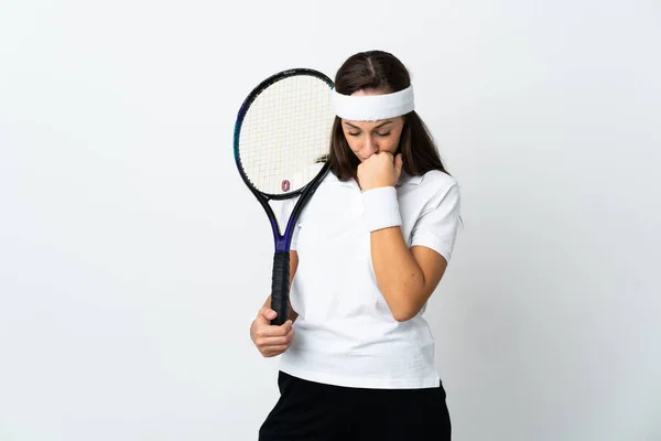 若いです女性テニス選手上の隔離された白い背景持っています疑問 — ストック写真